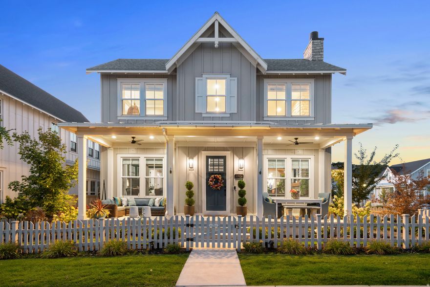 Rare opportunity to own a stunning home on the Exclusive Island at Daybreak. Luxurious features include soaring 20-foot ceilings and a striking stone fireplace in the great room, high end Thermador and Cafe appliances in the gourmet kitchen, and custom solid wood trim throughout. The main-floor primary suite offers convenient single-level living while flexible spaces can be converted to fifth and sixth bedrooms as needed. Relax in the beautifully landscaped yard on one of the Island's larger corner lots, framed by a timeless picket fence and featuring an enclosed patio with hot tub, a pergola with gas firepit, climbing grapevines, and raised garden boxes. The fully finished, insulated, oversized three-car garage with 10-foot doors provides extra space and convenience. Just steps from Oquirrh Lake, you will enjoy paddleboarding, kayaking, and evening strolls, along with access to all of Daybreak's amenities-five swimming pools, indoor courts, gym, track, 50+ miles of trails, dozens of parks, and included high-speed fiber internet. Explore the Matterport 3D tour and schedule your private showing today! ***Mortgage savings may be available for buyers of this listing***