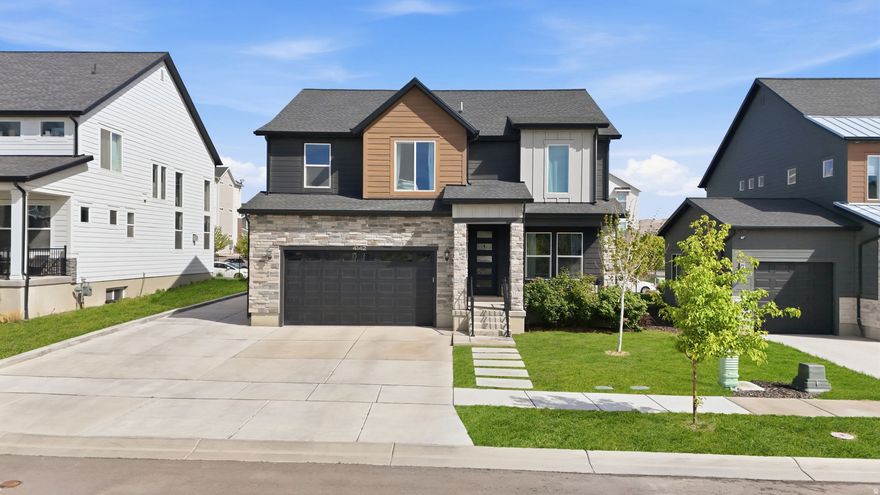 Welcome to this beautiful, fully-finished single family property in Gardner Point. This incredible home features 9-ft ceilings, a beautiful master bath with a large walk-in shower, 4 bedrooms upstairs and a spacious 2 bed, 1 bath mother-in-law suite with its own entrance in the basement. This home is perfect for generational living, or for offsetting your mortgage with rental income. With a fully finished yard, extra rv pad parking, a basement entrance, quartz countertops, and additional built-in storage in the garage, this home is one you won't want to miss!  Square footage figures are provided as a courtesy estimate only and were obtained from county records.  Buyer is advised to obtain an independent measurement.