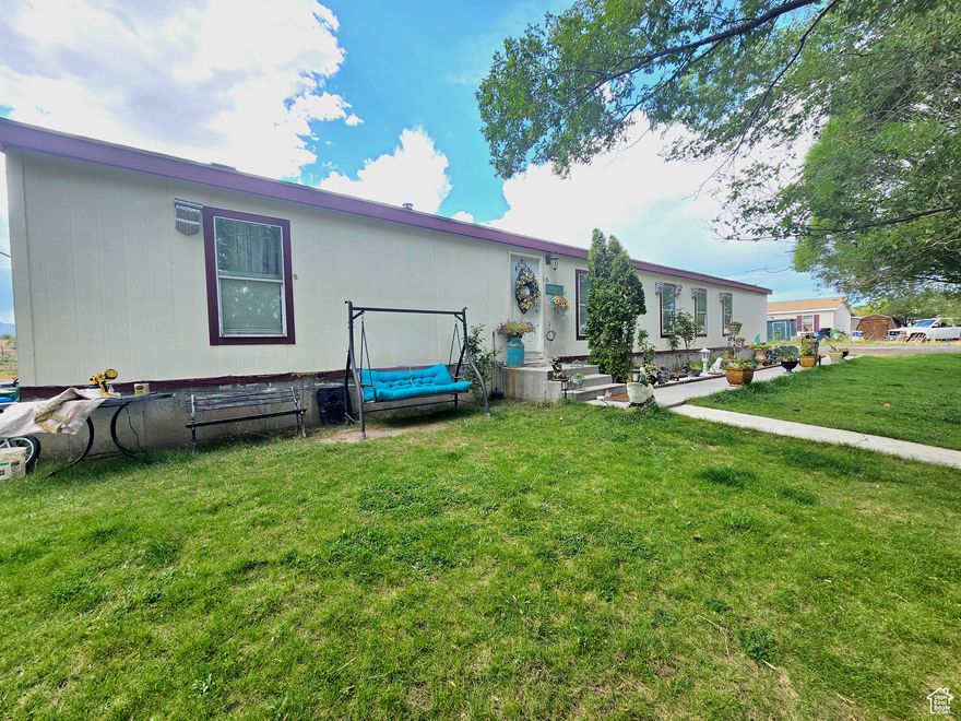 PRICE DROP.5 bedroom home on your own lot in Price, Utah. Fun, and open layout combining the dining, kitchen, and living room. Room to stretch and grow with a beautiful .77 acres and Mature trees around the home. Square footage figures are provided as a courtesy estimate only and were obtained from County Records.  Buyer is advised to obtain an independent measurement.