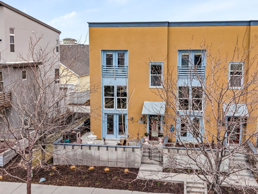 Welcome to elevated living in the heart of Daybreak, equipped with a NEW FURNACE AND AC! Tucked away on a secluded, spacious patio, this beautifully situated townhome offers soaring ceilings and expansive windows that flood the main level with natural light, while automatic blinds effortlessly shade the dramatic ceilings and create the perfect ambiance at any time of day. The primary suite features its own private balcony with serene views, perfect for morning coffee or unwinding in the evening. Enjoy the convenience of walking just two minutes to Harmons and nearby eateries, with Downtown Daybreak and the new Bees Stadium just minutes from your front door, placing entertainment, dining, and community events within easy reach. Experience low-maintenance living paired with resort-style amenities, scenic trails, and vibrant community spaces designed for a lifestyle that feels both relaxed and connected. Buyer is advised to verify all information, including square footage and HOA dues.