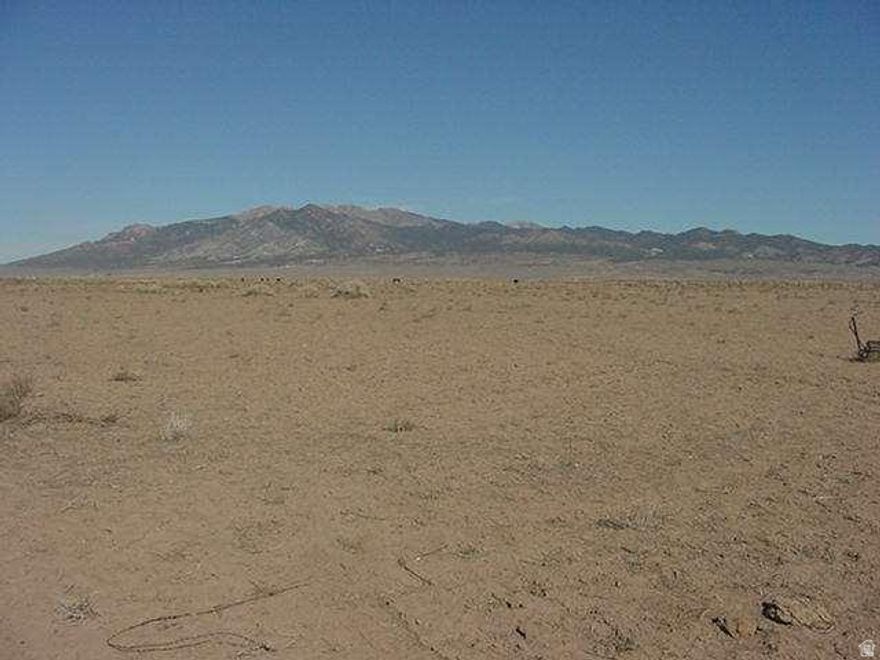 5 Acre parcel West of Minersville, comes with 1/2 Acre Feet Water, Water Right # 71-4501, quiet location, wonderful views, many possibilities. No utilities to property. Adjacent lot also available for sale. Present all offers!!! Seller will consider seller finance.