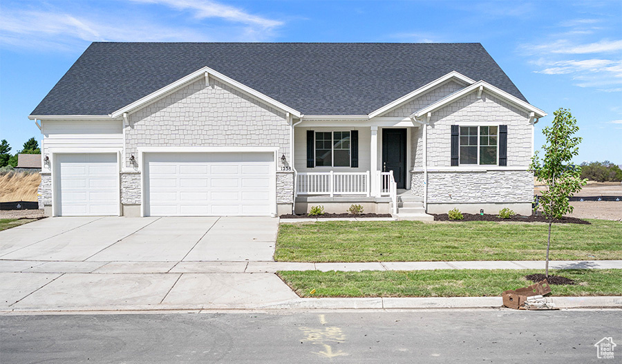 **Special Financing Available as Low as 3.99%** Enjoy Saratoga Springs living in this new Helena floor plan home. A charming covered front porch welcomes guests to the ranch-style home. Inside, you'll find a spacious great room and kitchen with a bumped-out Sunroom/Dining area, center island, and quartz countertops. The lavish primary suite boasts an immense walk-in closet and is separated from two additional bedrooms for privacy. Other highlights include a convenient powder room, an unfinished basement, and a 3-car garage. This is a fantastic opportunity for your buyer to own a Professionally Designed New Richmond American Home at an unbelievable price: estimated completion date - February 2025. Square footage figures are provided as a courtesy estimate and obtained from building plans.  The buyer is advised to obtain an independent measurement.