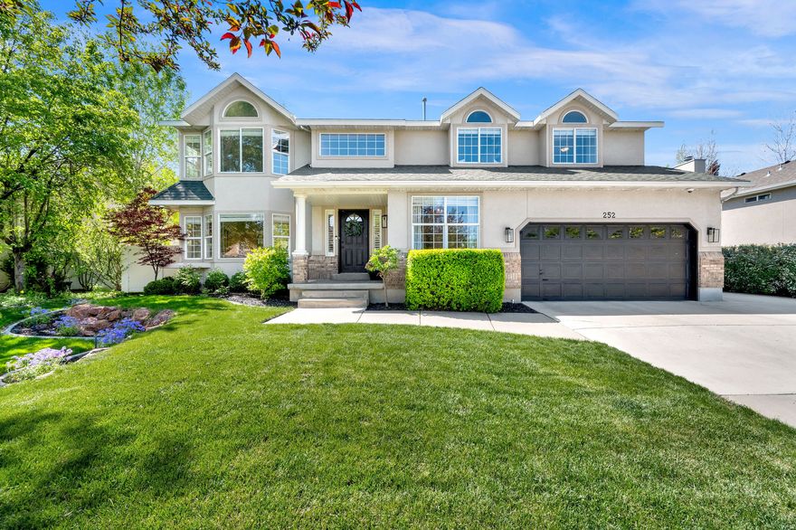This remodeled home offers move-in-ready perfection in Draper's desirable Cranberry Hill neighborhood.  Over 3,600 square feet, 6 bedrooms, a private office, and thoughtful layout, it seamlessly balances elegant entertaining spaces with everyday comfort. Upgrades include hardwood flooring, new carpet, quartz and marble countertops, updated lighting, new interior paint, and designer finishes throughout. The highlight is the luxurious primary bathroom-a true spa-like retreat. Additional peace of mind comes from the recently updated water heater and furnace. Outside, smart/app-controlled exterior lighting creates customizable ambiance for any occasion. The backyard features mature trees, plus a spacious deck and fire pit-ideal for summer evenings or gatherings.  Two parks within walking distance, just minutes from Costco, Trader Joe's, Juan Diego, Lone Peak Hospital, and easy access to I-15. No HOA. This home combines style, functionality, and an unbeatable location-ready for you to simply move in and start making memories.