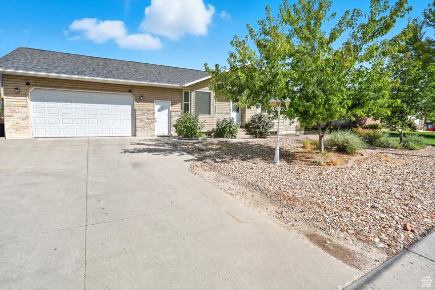 Don't miss this incredible opportunity to own a spacious 3,000 sq. ft. home featuring 7 bedrooms and 4 bathrooms on a large -acre lot. This property has been recently remodeled and is move-in ready with numerous upgrades, including a new roof, new A/C and furnace, and 34 solar panels that stay with the home for energy savings. The layout offers flexibility with a newly remodeled mother-in-law apartment complete with its own private entrance, perfect for extended family or rental income potential. Enjoy the outdoors with a fully fenced backyard, ideal for children, pets, and entertaining. Also, walking distance to a park, pickleball courts, splash pad, skate park, new Smithfield temple and elementary school.