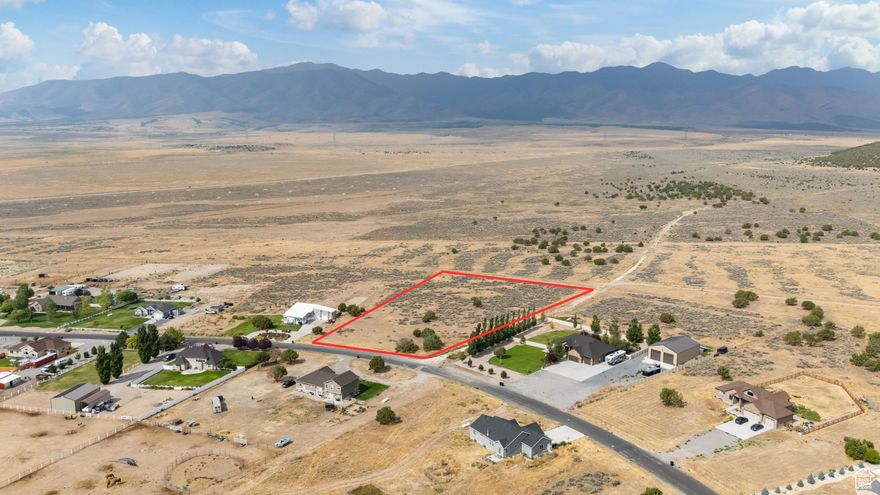 Prime Buildable Horse Property with Stunning Views. This flat, 3 Acre lot offers wide desert vistas, sage, and juniper trees-perfect for a custom home, weekend retreat, or Equestrian use. Zoned RR5: ADUs and farm animals are permitted (see page 30 of Chapter 15, Land Use Form). Enjoy privacy, natural beauty, and the potential for rental income or an additional dwelling. Seller financing available with 30% down and flexible terms. Buyer and Buyer's agent to verify all information.