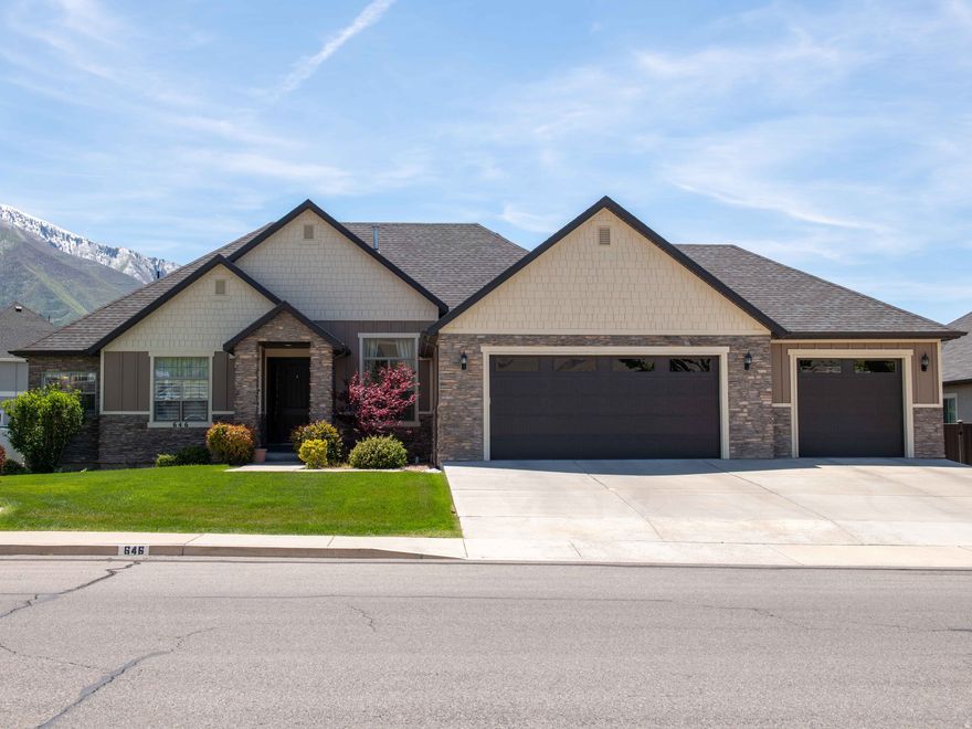 AN ABSOLUTELY STUNNING MAPLETON HOME in very desired EAST Mapleton LOCATION, LOCATION, LOCATION!  Enjoy your dinner on the back deck with incredible views of Maple Mountain or in your open concept kitchen. Don't want any projects? No Problem! This home is MOVE IN READY, just unpack and relax in the theater room right after your workout in the exercise room! Hate to exercise? No Problem! Turn the extra room into a craft room but don't even think about using it as a storage, you already have an incredible storage room under the garage with enough space for all the holiday decor. This home is truly stunning and READY FOR YOU! P.S. the basement has plumbing for a second kitchen!!
