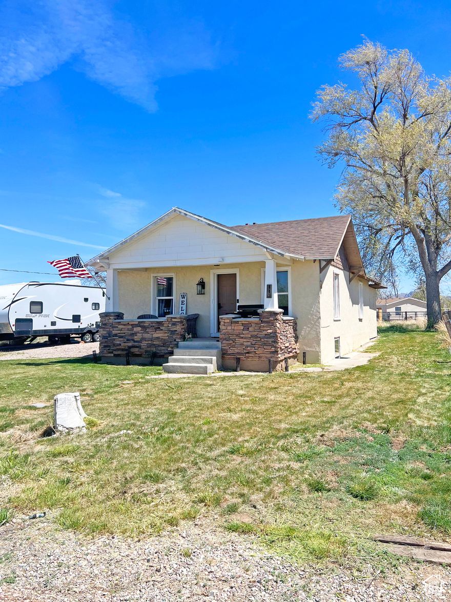 Welcome home to this charming remodeled home in a beautiful small town. 3 bedrooms, 2 baths. Master bedroom has wall closet perfect for extra bedding. Large window for plenty of natural light and is very spacious. The master bath has a jetted tub and shower, heated tile floor, blue tooth speaker, multi funcion spa head and color changing lights. And plenty of storage space.It also has a bath exhaust fan. The master closet  has the washer and dryer for easy access. The master closet also has his and her's closet space and plenty of storage. There is a heat/ac vent as well.. The kitchen has newer custom cabinets, quartz countertops, soft close everythiing, and a new refrigerator. A large bay window allows for natural light, and there is a nice exhaust fan above range. Dishwasher and large sink. There is a 3/4 bath on the main level as well. The bedroom in basement could also serve as a family room. The home has tons of upgrades. The yard has a fully automatic sprinkler system and ample parking. All  plumbing, electrical, paint, and flooring updated in 2023. Peaceful friendly neighborhood with stunning sunsets. Come have a look!     Buyer to verify all.