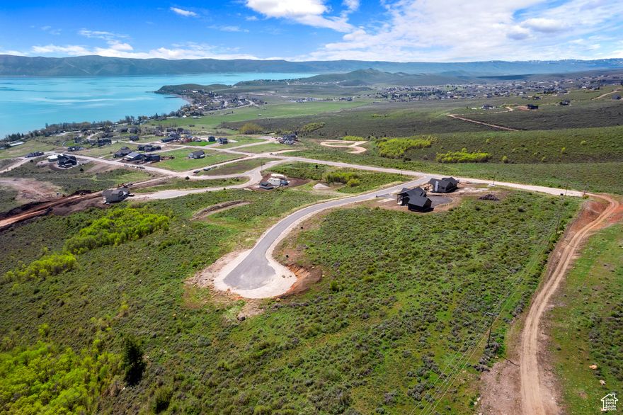 Stunning Bear Lake View Lot  .81 Acres with easy Year-Round Access on paved roads! Enjoy breathtaking panoramic views of Bear Lake from this spacious .81-acre corner lot. Located in a prime position, this property offers year-round access and is ideal for building your dream home, vacation retreat, or income-producing short-term rental. Surrounded by natural beauty, you'll have endless recreational opportunities right at your doorstep-whether it's boating and swimming in the lake or hiking and exploring the nearby mountains. Experience the best of both worlds with unmatched lake and mountain adventure! No HOA.