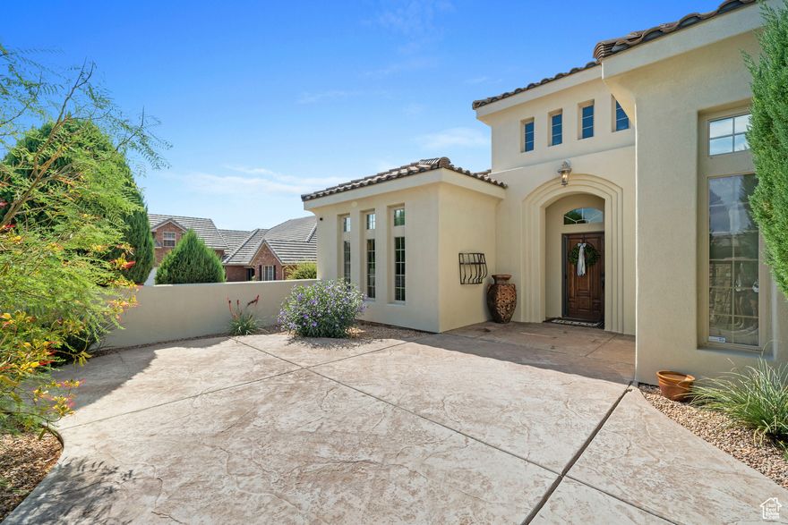 Welcome to this tastefully updated and upgraded home nestled in the beautiful Knolls neighborhood. This spacious residence features 4 bedrooms plus a den and 2.5 baths, all situated on a generous 1/3 acre private lot adorned with mature trees and landscaping. The private and gated courtyard enhances the front entry, while the large covered patio with a soothing waterfall offers a perfect outdoor retreat. Inside, enjoy fresh paint throughout, a large family, dining, and kitchen area ideal for entertaining, and impressive 10 ft. ceilings. The main bedroom suite is exceptionally spacious, with direct access to the patio. Additional highlights include new blinds and draperies, a new dishwasher, and a whole-home water system with reverse osmosis. The property is fully fenced with a block wall and gates, ensuring privacy and security.