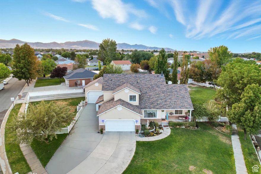 This stunning corner lot property has it all-half an acre of outdoor paradise paired with custom upgrades inside and out. Imagine anytime of the year sitting under the huge covered patio, the fire pit blazing, grilling on the built-in BBQ, all while relaxing by your own cascading waterfall and pond. The newly updated Trex deck is expansive, offering the perfect space to host gatherings, entertain guests, or simply relax with family and friends. Step inside to find a thoughtful layout with the master suite on the main floor, a walk-out basement with its own entrance (perfect for rental income or guests), and custom cabinetry & shelving throughout. The updates keep coming-new roof in 2023, heated third car garage/workshop (20'x25'x14') with 220v power and a loft, two RV parking pads, and irrigation water to keep your yard picture-perfect at a super low cost. This isn't just a home, it's a lifestyle-where luxury, comfort, and endless possibilities meet. Don't miss your chance to make it yours! Check out the 3D tour and schedule your showing today! Square footage figures are provided as a courtesy estimate only and were obtained from county records and an appraisal. Buyer is advised to obtain an independent measurement.