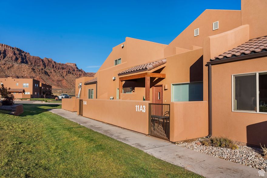 Welcome to Rim Vista! This beautifully maintained 3-bedroom, 2.5-bath nightly rental is being sold turn-key-fully furnished and ready to enjoy or rent. The open-concept layout includes a well-appointed kitchen, spacious living areas, and comfortable bedrooms. Outside, take in the sweeping mountain and red rock views from your private patio. A two-car garage plus ample parking provides plenty of space for guests and outdoor gear. Rim Vista offers excellent amenities including a pool, hot tub, tennis courts, and playground. Just minutes from downtown Moab and world-famous national parks, this property is the perfect blend of investment and adventure.