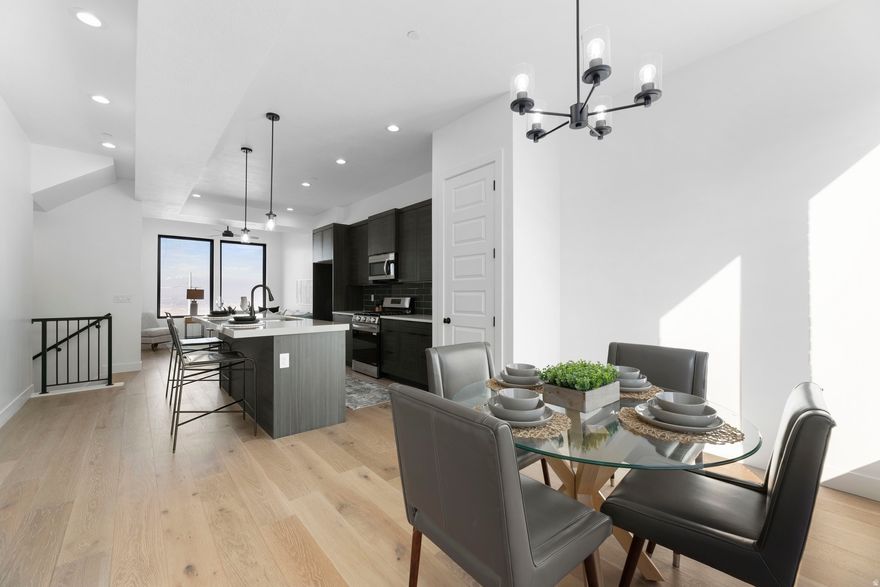 PREFERRED LENDER INCENTIVE! Brand-new construction offering incredible value with a seller-paid 1/0 temporary buydown to ease your first year of homeownership! Step into modern luxury with three spacious en-suite bedrooms, each featuring its own private bathroom for ultimate comfort and privacy. Revel in breathtaking panoramic views of the entire valley and majestic mountains from multiple vantage points-perfect for morning coffee or evening sunsets.  Stunning designer finishes and a sophisticated, on-trend color palette create a warm, welcoming atmosphere throughout. Don't miss this rare opportunity-schedule your private tour today! Seller is offering a 1% lender credit or a 1/0 temporary rate buy down when using the seller's preferred lender, subject to qualification and lender approval. This incentive is not available in combination with Utah Housing loans. Contact agent for full details.