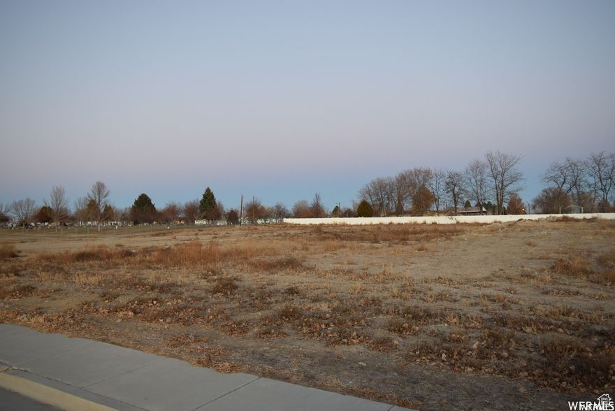 Great location close to schools and parks, the water park, and downtown. Culinary water, sewer, Power and irrigation water available in street. Buyer to verify all lot facts (acreage, boundaries, utilities, etc.) Acreage figures are provided as a courtesy estimate only. Buyer is advised to obtain an independent measurement.