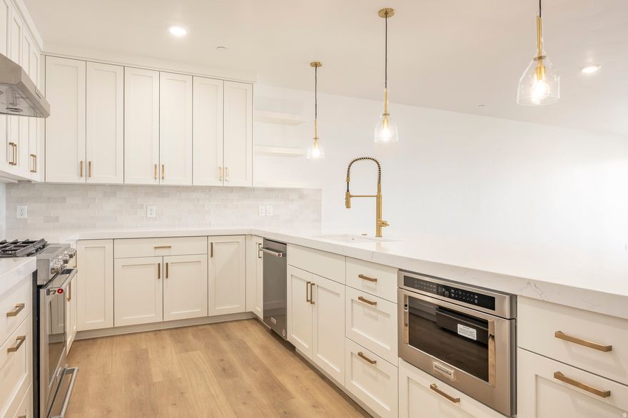 Discover effortless urban living at Apollo Square Condos in the heart of downtown Holladay. Now offering move-in ready, meticulously-designed luxury residences. These condos offer single-level living, open floor plans, natural light, and amazing views of the surrounding mountains and valley. Each unit boasts designer finishes, private outdoor spaces, and spacious kitchens. The complex offers secure underground climate-controlled parking, elevators, and ample storage, ensuring your comfort and peace of mind. Enjoy living in the vibrant Holladay City Village, where everything is within walking distance, including dining, shopping, grocery, food trucks, coffee shops, bakeries, post office, and entertainment. When you're ready to relax or gather with friends, head up to the rooftop patio, complete with a fire pit, BBQ, TV, gazebo, and lounge area and soak in the 360 degree views of the mountains and Salt Lake Valley. Make Apollo Square your new home and enjoy the best of urban and mountain living with lock-and-leave convenience! Model unit is open 12:00 PM - 5:00 PM, Monday - Friday and Saturdays 11:00 AM - 4:00 PM