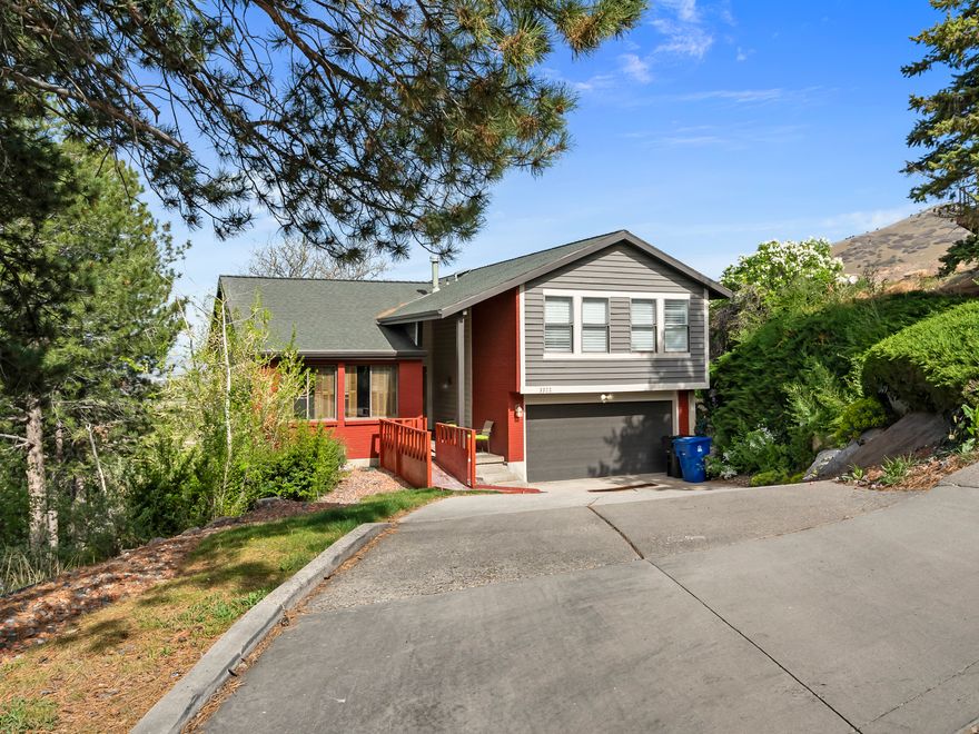 VIEWS and LOCATION cant be beat! Very desirable East Millcreek area, with incredible views of the entire valley and Mt Olympus! Recently updated flooring & baths. This is move in ready. Bring your best offer to the best home on the east bench! Hurry! This wont last long! Buyer to verify all info.