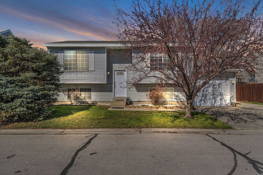 Welcome home to this beautifully updated property featuring a newly remodeled kitchen and stylish LVP flooring throughout the main living areas. The spacious primary suite has been thoughtfully expanded to create a true first-level retreat with a private ensuite.  Downstairs, the bright basement offers incredible flexibility, including an oversized bedroom that can easily double as an additional family room, home gym, or office. Step outside to a covered patio overlooking the backyard and cozy firepit area, perfect for relaxing evenings and entertaining friends. Conveniently located close to shopping centers and schools, it provides comfort and accessibility in one great package