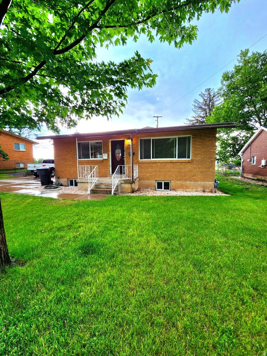 Beautifully updated townhouse in Riverdale offers a spacious 2-bedroom, 1-bath layout with a large open great room ideal for comfortable living and entertaining. 1000 SF garage with tons of storage. Enjoy an amazing view of the valley from the covered deck, and take advantage of abundant parking options plus an extra parking space. The property includes a large garage shop featuring a 12-foot-high automatic door and a separate storage shed for additional storage needs. Clean updates and thoughtful layout make this residence a convenient option in a desirable location. Beautifully updated duplex. Very spacious layout. Off street parking and a storage shed and 40' x 25' shop with 12' tall automatic door and 14' ceilings. Plenty of lighting and large windows throughout. Washer and dryer hookups. Liability insurance required. No smoking. Pets allowed with a $50 monthly pet fee.