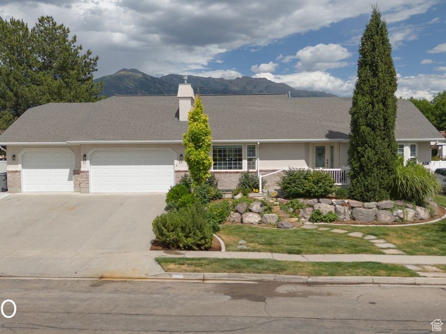 A Home You Can't Miss  Priced to Sell! Own a property that checks all the boxes: expansive main floor living, an income-generating apartment (or perfect for multi-generational living), a spacious 4-car garage, RV parking, and the added benefit of solar panels. This 4,000 sq ft. home features a large gathering area, two main-floor primary suites, new carpet, solid maple flooring and cabinetry, and generously sized rooms throughout-including an office that can be used as a formal living room, music room, or dining room. A two-bedroom American Fork City approved ADU apartment with its own address offers additional income potential. The finished 4-car garage includes EV charging, a work area, and plenty of space for all your toys. The RV pad is a dream setup, complete with a dump station, electrical hookup, and a frost-free water tap. The home also features paid-off solar panels, capable of powering the home during emergencies. Enjoy beautiful curb appeal with the professionally landscaped yard. Located in a highly desirable area just minutes from top-rated schools, Costco, American Fork Canyon, and the thriving tech hub of Silicon Slopes. Come walk through this home to experience everything it has to offer!
