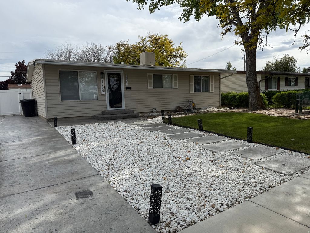Photo of 1833 W CHATEAU AVE W, Taylorsville, UT 84129 (MLS # 2154213)