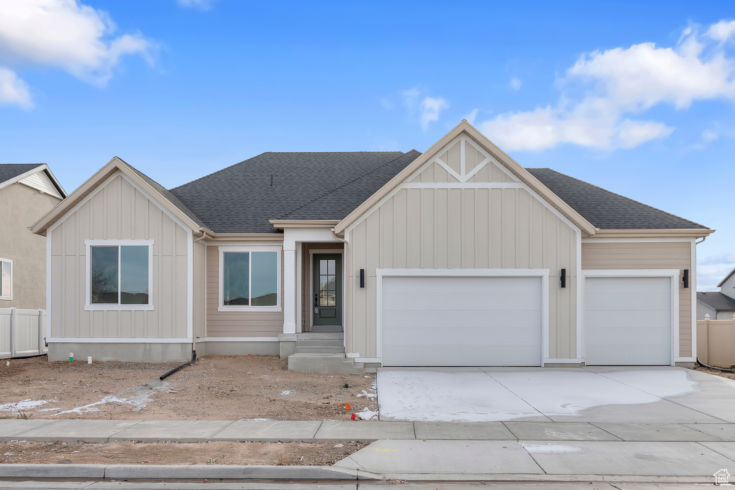 Come see this beautiful brand new Torino farmhouse home in a great Syracuse community! This beautifully crafted residence features a chef's kitchen with maple cabinets with LED lighting, complemented by quartz kitchen countertops and full-height backsplash, pendant lighting above the island, french door refrigerator and stainless steel gas appliances. The home boasts a blend of laminate hardwood, tile and carpet flooring, enhancing both style and comfort. The expanded 3-car garage with enlarged bay doors provides ample space, while the box windows in the kitchen nook and owner's bedroom add charm and natural light. The owner's bathroom is a luxurious retreat with stylish tile surrounds, a Tori tub and black matte hardware, ensuring comfort and relaxation. Additional ceiling fans in the family room and owner's bedroom, along with can lighting, create a well-lit and airy atmosphere and a gas log fireplace in the family room provides added functionality and warmth. Textured walls, two-tone paint, and Entrada base and casing complete this stunning home, making it a perfect blend of modern amenities and farmhouse charm.