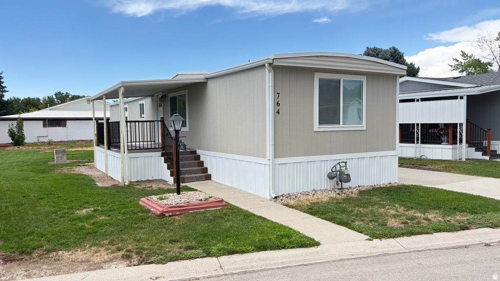 Photo of 764 W MONTE BLANCO ST #102, Taylorsville, UT 84123 (MLS # 2183155)