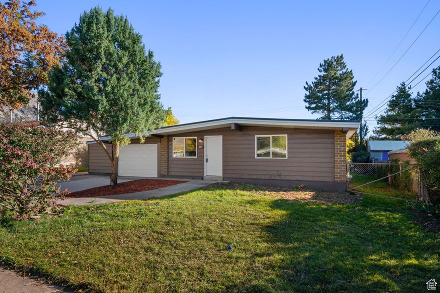 Welcome to this stunning 4-bedroom, 2-bathroom home! Featuring 1,500 sq. ft. of thoughtfully designed living space, this recently remodeled single-level home perfectly blends modern comfort with classic charm.  Step inside to discover an inviting open floor plan filled with natural light, fresh finishes, and stylish updates throughout. The spacious living area flows seamlessly into the beautifully upgraded kitchen.  All four bedrooms are generously sized, offering flexibility for a home office, guest room, or growing family. Both bathrooms have been tastefully updated with contemporary fixtures and tile work, giving the home a clean, modern feel.  Outside, enjoy a large fenced yard-perfect for gatherings, gardening, or relaxing under the mountain views. The attached 1-car garage adds convenience and extra storage.  Located in a quiet, established neighborhood just minutes from Weber State University, hiking trails, parks, shopping, and downtown Ogden, this home truly has it all-style, location, and move-in-ready comfort.