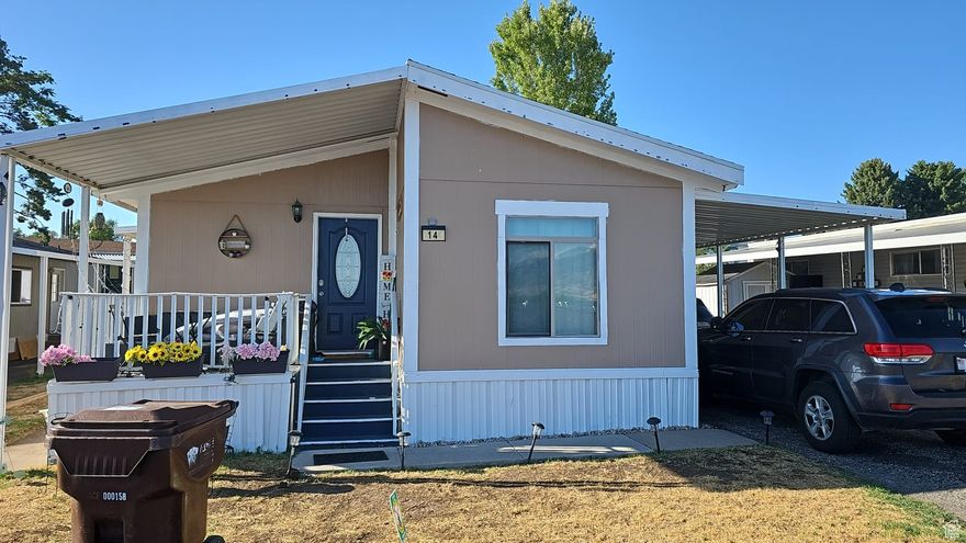 maintained property features bathrooms and a kitchen in excellent condition. The park is serene and Stunning mobile home in Layton with breathtaking views and scenic landscapes.