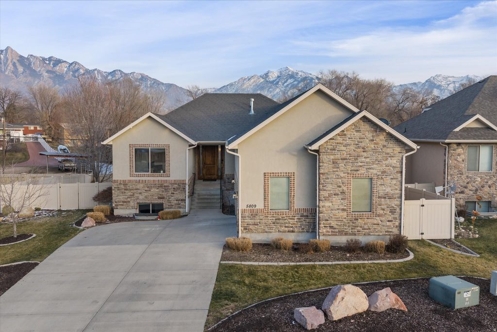 Photo of 5809 S BLUE FLAX LN E, Salt Lake City, UT 84121 (MLS # 2132593)