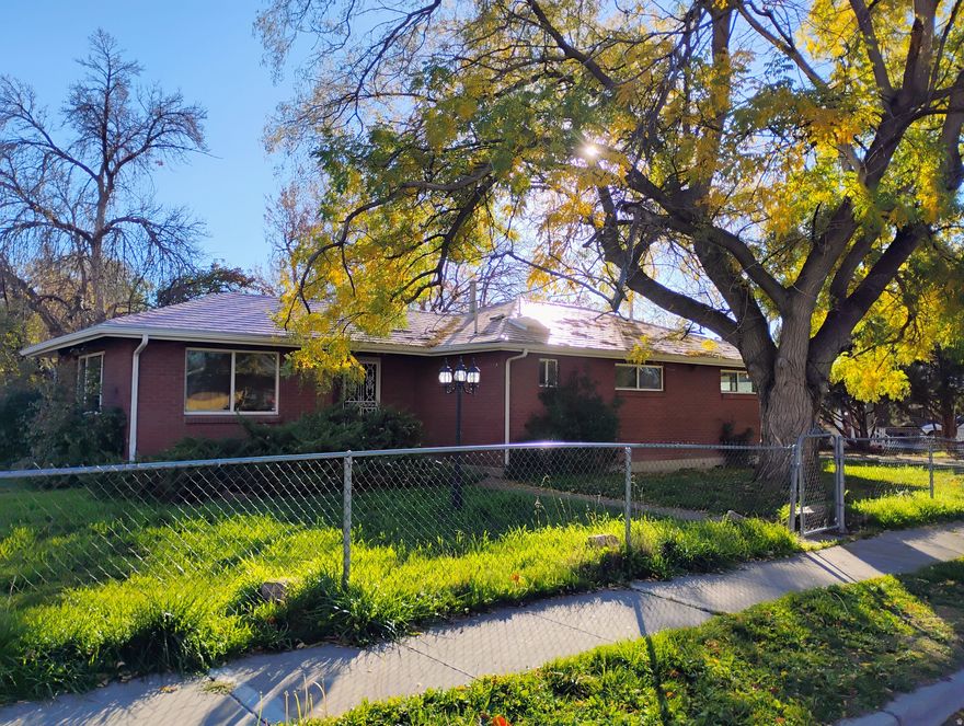 Beautiful, updated 3 bedroom, 1.75 bathroom home in a quiet Salt Lake neighborhood. -Large, .29 acre corner lot, great for gardening or outdoor living -Central air conditioning -Updated kitchen and bathrooms -Convenient, single story living -Original hardwood flooring -Large, fully fenced backyard great for outdoor entertaining and provides security and safety for children and pets. Plenty of space for gardening, fruit trees, flowers, or other plants. -Large mostly fenced front and side yard -Large detached 2 car garage and additional carport/covered patio -Secondary driveway; RV/trailer or boat parking available -No HOA/no HOA fees -Located in a wonderful walkable area. Right across the street from the Jordan River Trail and Riverside Park; two blocks from the library, grocery store, credit union and bank, and more. -Square footage provided is accurate according to our knowledge. Buyer is advised to obtain independent measurements if desired. -Less than 10 minutes from the airport, and 10 minutes to downtown SLC! Schedule your private tour today!