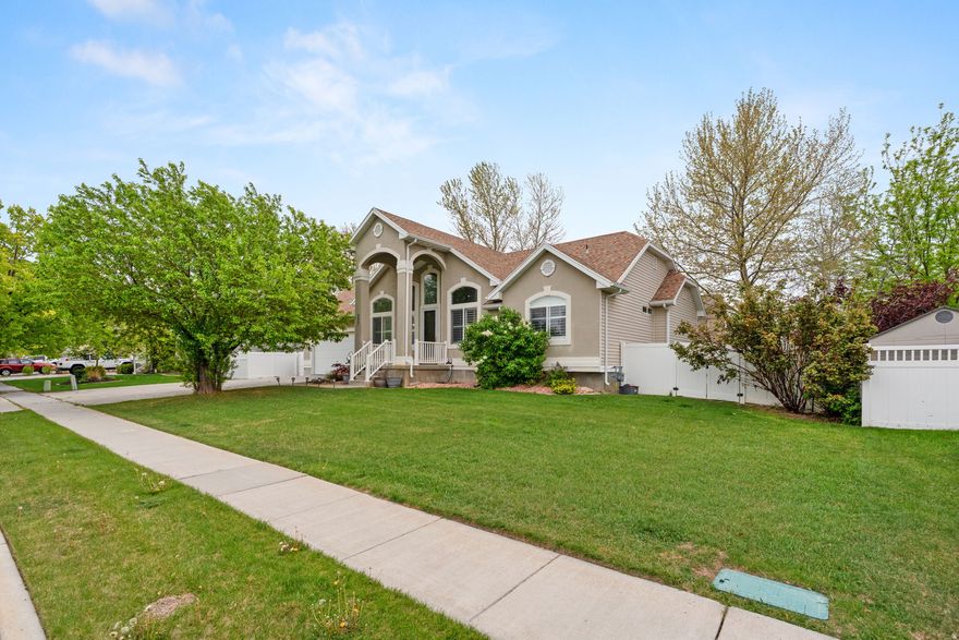 Enjoy lakeside living in this beautiful 3 bedroom, 3 bathroom home located directly across from Stansbury Lake. Featuring a spacious open floor plan, vaulted ceilings, and brand-new carpet, this home offers comfort and style throughout. With easy lake access, it's the perfect place to relax and enjoy the best of the area. Nearby golf course, community pool, and plenty of other local activities add to the appeal, all without an HOA!  FREE LENDER PAID 1-0 Buy down Is being offered by many lenders  through the end of JUNE!