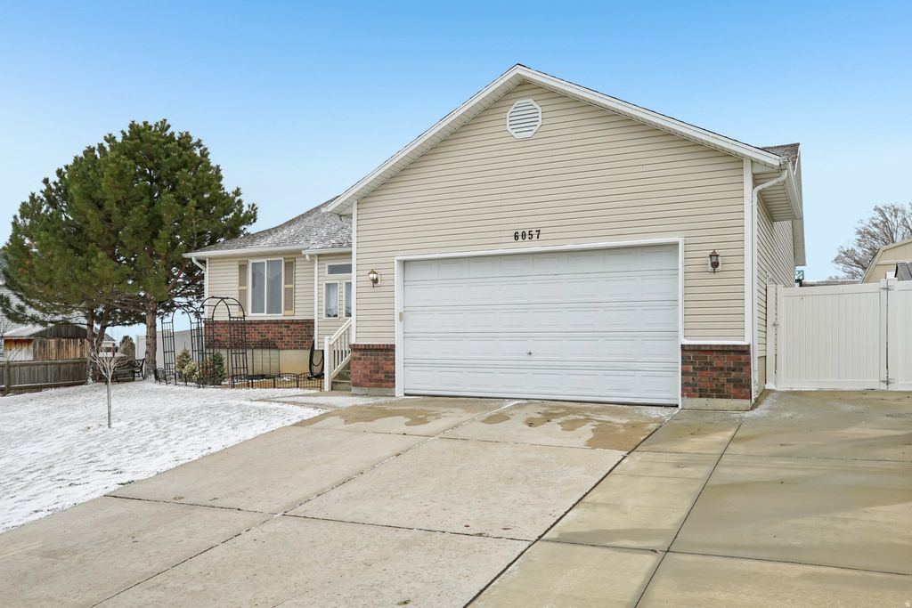 Photo of 6057 W MINERS MESA DR, West Jordan, UT 84081 (MLS # 2138352)