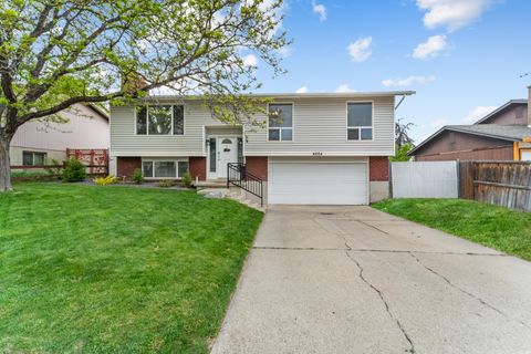 Photo of 4884 S HUNTINGTON RD W, Taylorsville, UT 84129 (MLS # 2151064)