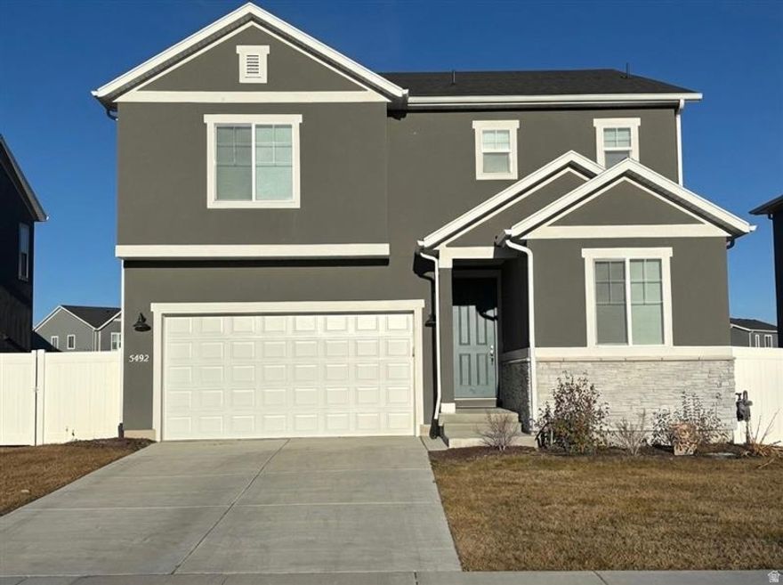 Welcome to this stunning, move-in ready, 4-bedroom, 2.5-bath home offering over 2,600 sq. ft. of thoughtfully designed living space. Built in 2023, this open-concept layout features a chef's kitchen with sleek quartz countertops, stainless steel appliances, and a spacious island perfect for entertaining. An extra downstairs room can be used as an office, library, or guest room. Upstairs, you'll find 4 generously sized bedrooms, including a large primary suite with an oversized walk in closet. The home also boasts a versatile loft, ideal for play area or media space. Outside enjoy your private backyard that backs up to a beautiful park with a playground and mountain views. Minutes walk away from Cory Wride Memorial Park.