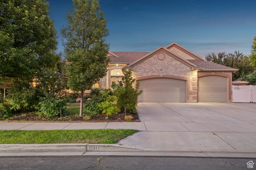 Welcome to this luxurious, recently renovated rambler in the highly sought-after Jordan Farms neighborhood of South Jordan-where there's no HOA to worry about. With over $250,000 in designer upgrades completed in 2022, this home blends upscale finishes with everyday comfort. The chef's kitchen features a Subzero refrigerator, high-end built-in range and stove, and a spacious island perfect for entertaining, while the dining area boasts elegant built-in china cabinets. The primary suite is a true retreat with a no-step steam shower, soaking tub, and an illuminated walk-in closet. Two additional main-floor bedrooms and a large laundry room make single-level living effortless. It has both a 4-car garage and RV parking that leads to a versatile basement entrance. With the potential for an apartment or mother-in-law unit it has its own entrance, second kitchen, second laundry, two more bedrooms, a bathroom, theater room, and custom office space. Outside, enjoy stunning Wasatch Mountain views from the new concrete deck and relax in the professionally landscaped backyard with an 8-foot privacy wall and mature trees. Sq Ft provided as a courtesy, buyer to verify.