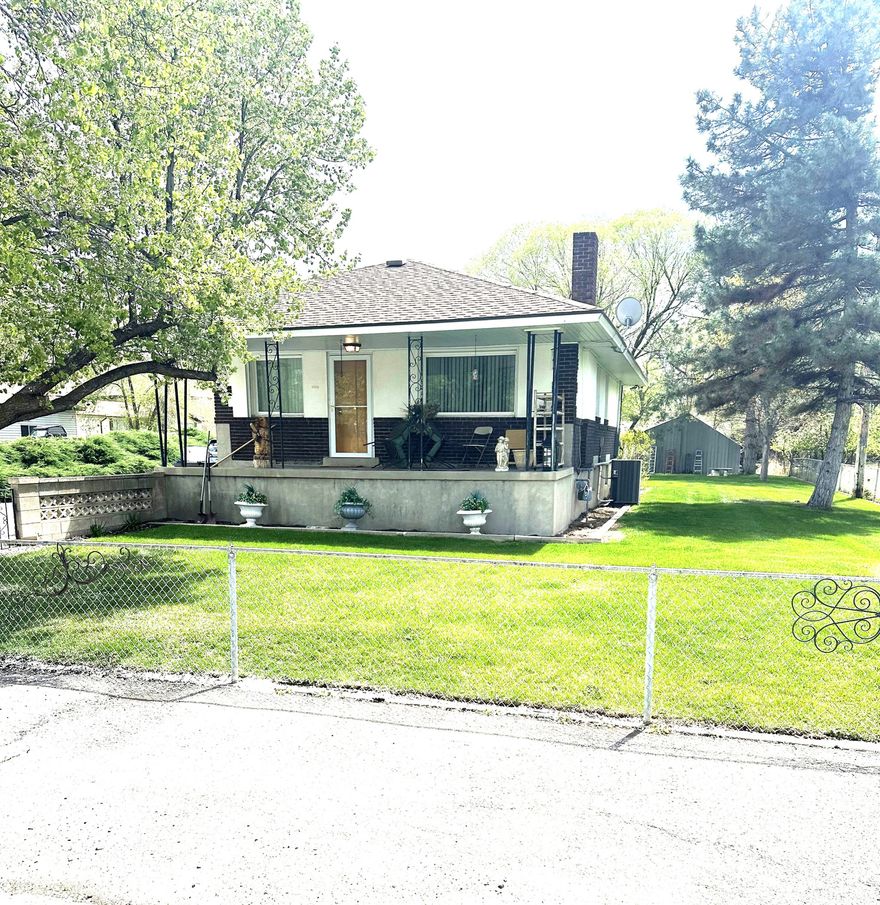 Make it yours, NO restrictive HOA or CC&R rules! **Improvemens all NEW within the last 2-5 years... furnace, central air, hot water heater, windows, electrical and plumbing!  GET this Large secluded .74 acre property, bugalow home w/ an awesome front porch, PLUS>>>Three Large Garages (two have shop heaters), shelving, work bench, sink) Bring yours or getcha some toys!! Great for a business owner needing garage space or hobby farm needing a barn or two! Dead end street, Desired open RV parking/storage. Home has new LVP flooring on the main level. Nice shady backyard. Zoning allows for large animals. Multi family zoning is near by. This is an Estate sale w/ limited disclosures. Broker is related to sellers. The middle garage has a dirt floor, the other two have cement floors. So many possibilities, live your best lifestyle here!! Perfect for home business, great income or investment property. The driveway on the east allows access (easement) to the back east home and the rear of this property.