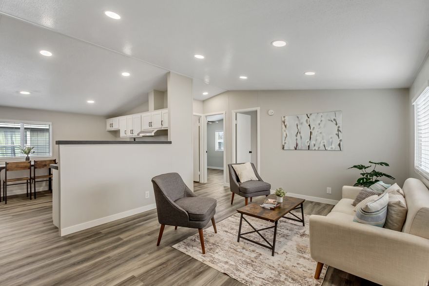 STOP RENTING!  If you're paying $2,000+ per month in rent... this might be exactly what you've been waiting for.  This beautifully remodeled 1,300 sq ft double-wide offers 3 bedrooms, 2 bathrooms and is priced under $100K - yes, really.  Estimated monthly payment $1800 (including the $1,080 lot rent) (buyer qualification dependent). Why keep paying your landlord when you could own?  - Gorgeous updated kitchen  -Beautifully remodeled bathrooms  -Brand NEW windows  Central A/C  -Corner lot  -Family community with playground & swimming pool.  Location? Unbeatable. Just minutes from the freeway, Mountain View Corridor, Bangerter Highway, shopping, and restaurants. Location. Location. Location.  Homes at this price point - with these upgrades - do not last long.  Buyer qualification required.  As a bonded and licensed manufactured home dealer, I specialize in helping buyers successfully navigate manufactured homes.   Call today before someone else stops renting and grabs it first.  Square footage provided as a courtesy measurement only. Buyer/Buyer Broker to verify all information. All residents must be approved by the park. Payment estimate subject to lender terms and buyer qualification. Equal housing opportunity.