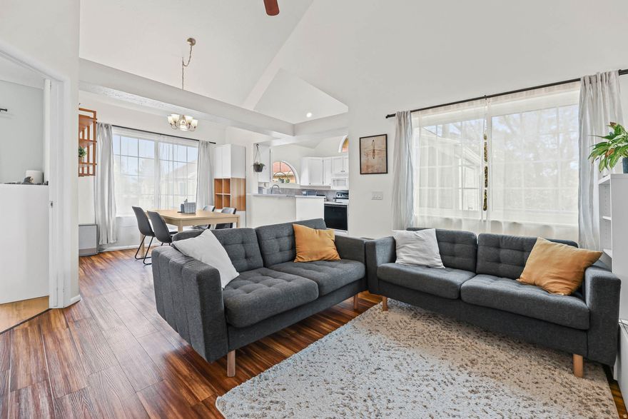 Move-in ready home with an open concept floorplan, fabulous large primary suite, fantastic community amenities, and an attached garage! Ideally situated in a coveted Taylorsville community just moments from shopping and schools, surrounded by 3 different overflow parking areaswhich is HUGE for communities like this. This immaculately maintained condo affords a dreamy lifestyle of both comfort and convenience. Step inside to instantly feel at home with thoughtfully curated design choices. The openly flowing interior inspires with soaring vaulted ceilings, abundant natural light, gorgeous fauxwood vinyl floors, gas fireplace, and neutral paint. Bursting with entertainment value, the living room adjoins the cozy dining room. While conversing with guests, whip up delicious goodies in the open concept kitchen, which has white appliances and stylish two-tone cabinetry. Fashioned with a contemporary color scheme, the oversized primary bedroom promises relaxation with high ceilings, walk-in closet, and a chic accent wall. The primary bedroom also enjoys direct access to the beautiful, updated full bathroom. One additional bedroom features a sizable closet and may also serve as a home office or flex space. Other features include an attached one-car garage with overhead storage, NEWER heating/cooling system (replaced in 2021), party-perfect balcony, near public transit, I-15, I-215, Salt Lake Community College, dog parks, restaurants, movie theaters, and hospitals. Perfectly situated within the community near amenities including: community pool, spa, clubhouse, racquet ball court, gym, tennis court, and more! Schedule your private tour today!