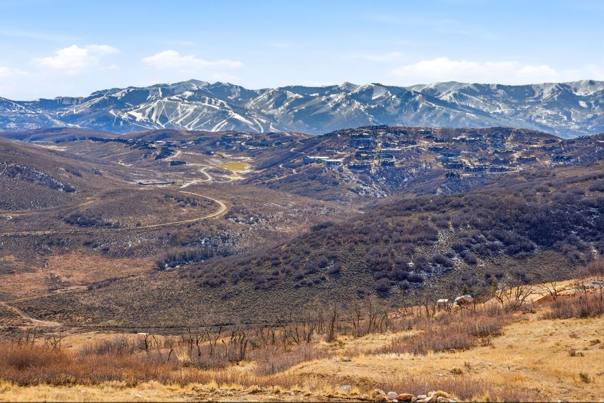 Set within the scenic community of Lake Rockport Estates, this exceptional one acre homesite captures sweeping 180 degree views of the Wasatch Mountains and the iconic ski runs of Deer Valley and Park City Mountain Resort. Perfectly positioned for year round adventure, owners enjoy immediate access to hiking and biking trails, boating on Lake Rockport, and quick connectivity to Park City, Deer Valley East Village and Oakley. Significant infrastructure is already in place, including a highly sought after water meter, graded driveway, pre-dug foundation, recent land surveys, septic, stubbed electric, and potential house plans, creating a rare head start for buyers, builders and investors alike. Whether envisioning a primary residence, mountain retreat, or strategic investment, this lot offers lifestyle and value in one compelling package.