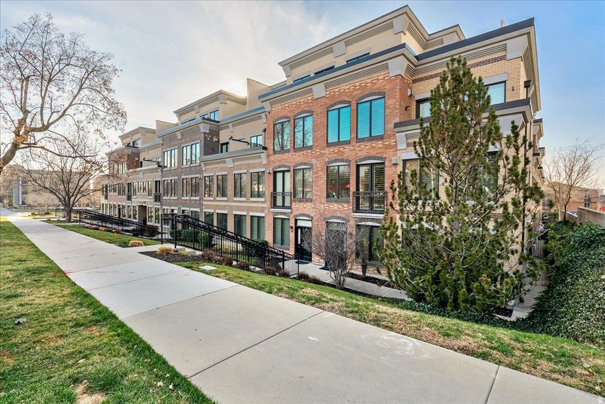 One of the largest floor plans at the One & Nine Condos, located in a prime downtown location near 9th & 9th, TRAX and the University of Utah. This well-designed unit features two bedrooms with ensuite bathrooms, including a spacious primary suite with dual sinks and separate walk-in closets. Large windows with plantation shutters provide abundant natural light, plus two built-in desks. One bedroom includes a Murphy bed, offering flexible use. The kitchen features new appliances with a standard manufacturer warranty through 12/16/26. Building amenities include secure underground parking with two assigned spaces, ample guest parking, a heated driveway, two elevators, and a separate storage closet on the same level. Community amenities include a courtyard with seating and firepit, clubhouse, and gym. Square footage figures are provided as a courtesy estimate only and were obtained from county records.  Buyer is advised to obtain an independent measurement.