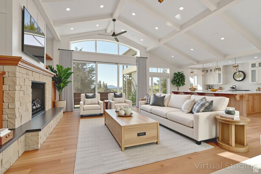 High on the east side with amazing views of the valley. This Home offers a stunning floor plan with a huge kitchen, butler pantry with top of the line everything and a bar that will sit 10. Huge Family room with vaulted ceilings, tons of windows with sliding walls to the wrap around deck.  Indoor/Outdoor living at it's finest. Additional kitchen and weight room in the daylight basement. Incredible remodel with new and high end everything.  The Seller hasn't left the garage person out either as this home features a 6 car garage with an additional garage for tools and equipment. Schedule your showing today as this home will not disappoint. Welcome Home!