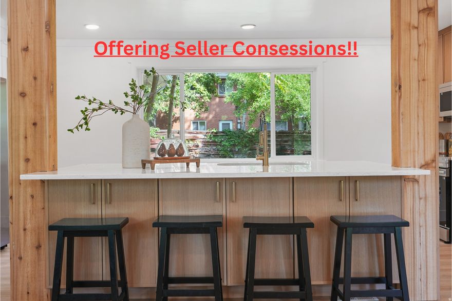 **Seller is open to Seller Financing with 20% down. **Welcome to this beautifully renovated 5-bedroom, 2-bathroom home designed with both style and function in mind. The open floor plan features a stunning kitchen with high-end, soft-close cabinets, creating the perfect space for entertaining and everyday living.  The lower level offers a full mother-in-law suite with its own kitchen, laundry hookups, and a cozy wood-burning fireplace - with the potential for a separate entrance, this space is perfect for extended family, guests, or rental opportunities.  With 2 laundry hookups, 2 kitchens, and thoughtfully updated finishes throughout, this home is as practical as it is beautiful. The bathrooms have been freshly updated with modern touches, and every detail has been carefully designed for  comfort.  Outside, you'll find mature trees (including 3 different fruit varieties) and a quaint backyard patio area, creating a private and relaxing outdoor retreat.  This move-in-ready home offers endless possibilities - whether you're looking for a multi-generational living space, rental income potential, or simply a gorgeous home to call your own.  Square footage figures are provided as a courtesy estimate only and were obtained from country records.  Buyer is advised to obtain an independent measurement.