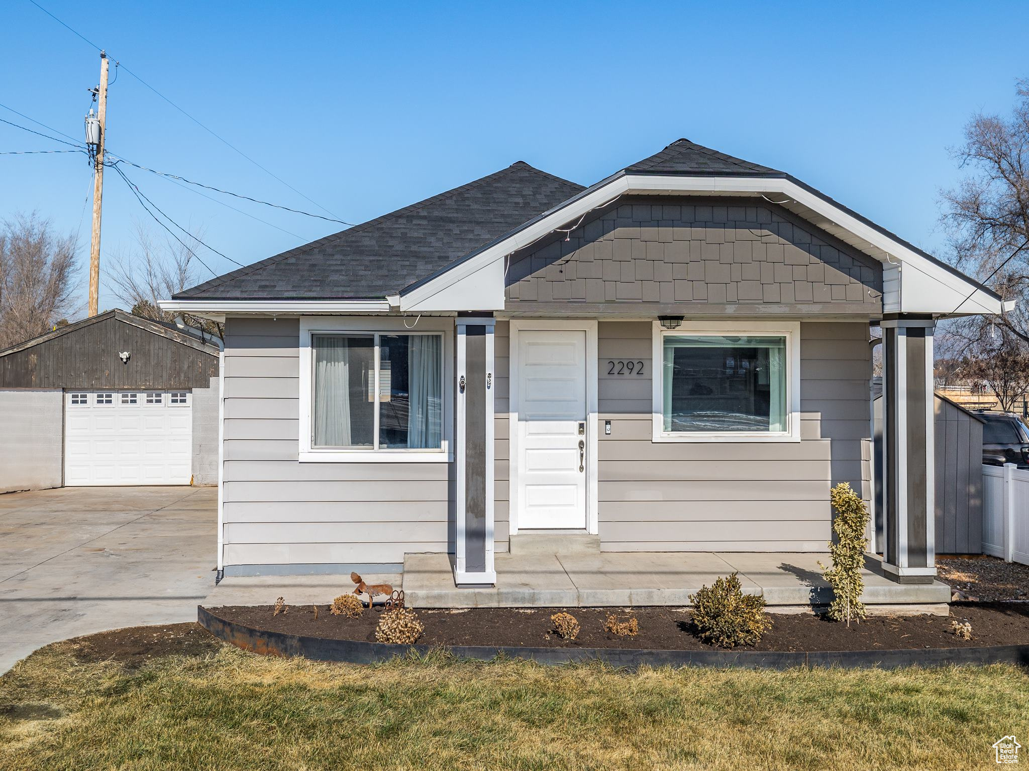 Step inside this completely updated home in the heart of Riverton! This home was taken down to the studs and all new pex plumbing, electrical, and HVAC have been installed. The main floor offers an open concept with a clean, bright kitchen with quartz counter tops and new appliances. The basement has 2 bedrooms, a full bathroom and a large living room. The large detached garage is big enough to fit two cars or be used as a large work shop. The garage features a 50 amp plug and built it workbench.  Other upgrades include permanent Grove trim lights, a Ring camera doorbell, and a roof that was replaced 1 year ago! The location can't be beat! You are minutes from Bangerter Highway and I-15 access. Also a short drive away are the shops at Mountain View, Costco, Walmart, and more! Come check it out today!