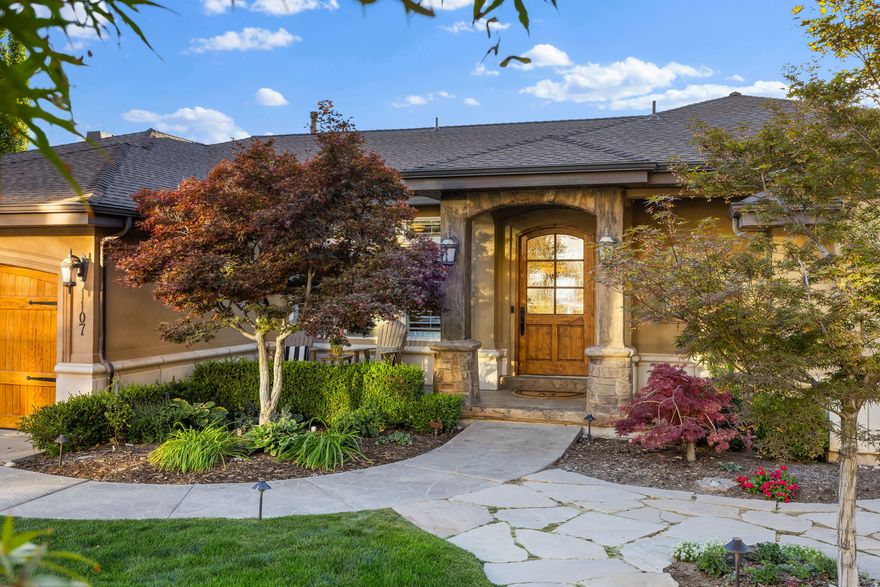 $200,000 Price Improvement. Perched high above the valley in Dorchester Pointe, this walkout rambler offers panoramic views and unforgettable sunsets. The setting is elevated, private, and truly special. Expansive decks extend the living space outdoors, creating the perfect place to gather, relax, and take in the horizon. Inside, generous proportions and natural light define the home. A Wolf and Sub-Zero kitchen anchors the main level, ideal for both everyday living and entertaining. The primary suite provides a private retreat with a steam shower, air-jetted soaking tub, and direct access to the outdoors. The lower level opens to landscaped grounds and a secluded hot tub patio. Classic architecture, strong bones, and the rare opportunity to make this incredible house your dream home.