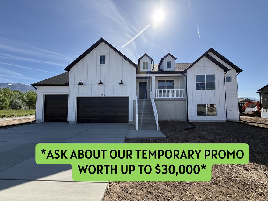 **Ask about our promo worth up to $15,000!**  This stunning rambler in Plain City's sought-after Diamond E neighborhood features vaulted ceilings, a feature fireplace, designer kitchen, and a fully finished basement-perfect for entertaining or extra living space. No HOA, mountain views, and modern finishes make this home a rare find.