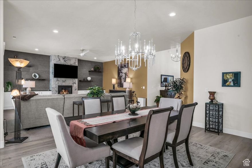 Stunning Single-Level Home in Desirable Shooting Star Estates! Beautifully designed floor plan offers both comfort and functionality. Bright and spacious great room features abundant natural light and a fireplace with floor-to-ceiling Italian porcelain surround. Gourmet kitchen includes stainless steel appliances, walk-in pantry, and high-end solid surface and tile finishes. Private primary suite with spa-like bath, dual vanities, soaking tub, and tile shower. Additional features include two guest bedrooms, a tech office (optional 4th bedroom), mudroom, laundry room with new Samsung washer/dryer, and a fully insulated, climate-controlled 3-car garage with epoxy flooring. Interior upgrades include custom cabinetry, tall ceilings, designer lighting, SPC flooring, tinted and shuttered windows, and owned water softener. Resort-style backyard with extended covered patio and space for a pool. Low-maintenance landscaping with artificial turf, mature evergreens, and gated RV/boat parking. Bonus: 17' x 12' insulated shed with 120V A/C power. Community amenities: parks, playgrounds, walking/biking paths, and pickle ball courts. Easy access to hiking, ATV, and motorcycle trails in surrounding hills.