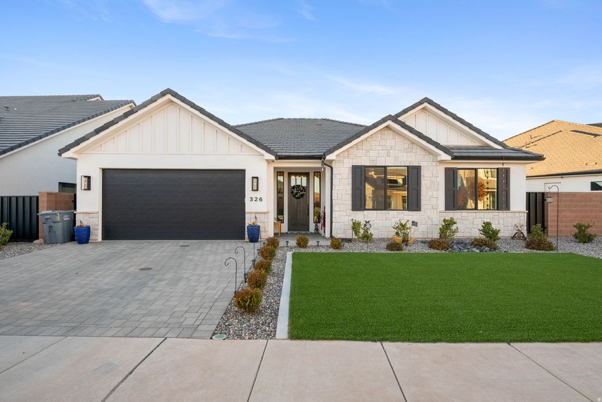 Welcome to this immaculate and thoughtfully designed home located in Red Mesa. Offering modern finishes, spacious living areas, and community amenities, this property provides comfort, style, and convenience all in one. Step inside to an open-concept layout filled with natural light, built-in entertainment center and tray ceilings. The kitchen features quality finishes such as, built-in appliances, kitchen island and full length cabinets. The primary en-suite with wainscoting wall, modern fixtures and bright windows creates a relaxing space. The bathroom with separate soaking tub, walk-in shower and large walk-in closet. Throughout the home, you'll find tasteful upgrades, excellent storage, electric blinds in kitchen, primary bed & front room, & a well-planned layout that maximizes space. Enjoy the beautiful Southern Utah weather in your private outdoor area that is fully fenced and landscaped. The community enhances your lifestyle with amenities such as parks, walking paths, and proximity to schools, shopping, dining, and recreational hotspots.