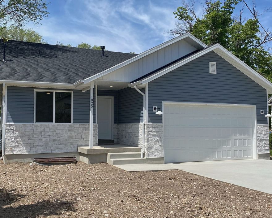Welcome to this brand new rambler home featuring 2 beds and 2 baths. With a mirrored basement floor plan, there's potential for a separate ADU. This home has a spacious master suite at the North end, and a convenient spare room with proximity to the second bath. The open kitchen, complete with an island, is bathed in natural light from surrounding windows, creating an inviting space for guests. The backyard is serene with mature trees providing natural shading and lush greenery, ideal for outdoor enjoyment. Conveniently located near top employers, Ogden Canyon for hiking, Weber State University, and the vibrant atmosphere of historic 25th St. With no HOA fees and nestled in a charming established neighborhood, this brand new home is ready for you to move in! Schedule a showing today!