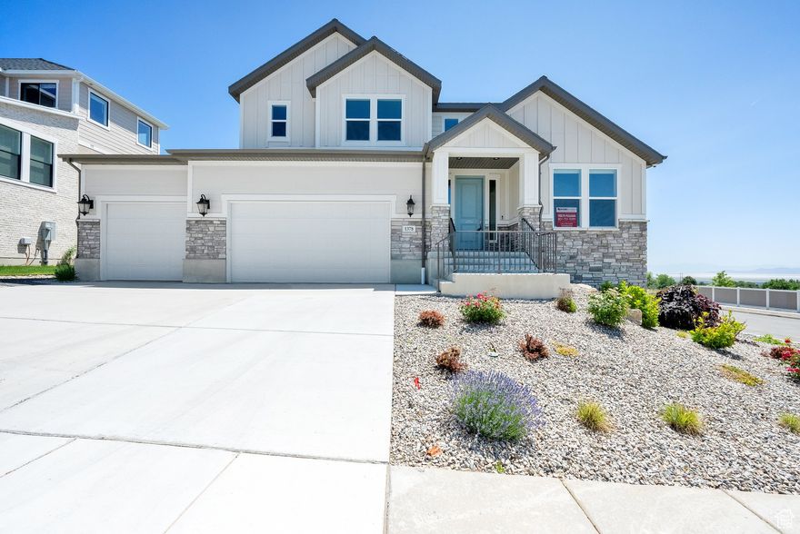 Welcome to this beautifully maintained home in the heart of Kaysville! Nestled in a quiet, desirable neighborhood, this spacious 3,658 sq ft residence offers 3 bedrooms, 2.5 bathrooms, and a rare 3-car garage; perfect for families or those seeking extra space. This home was a model home which includes many upgrades.   The main level features an open-concept design with vaulted ceilings, abundant natural light, and a large kitchen ideal for entertaining. Enjoy a cozy family room with a fireplace, formal dining, and a dedicated office or flex space. The primary suite is generously sized with a walk-in closet and a luxurious en-suite bath.  Downstairs, a full unfinished basement provides endless potential for customization; create your dream theater, gym, or additional bedrooms.  Outside, the private yard offers mature landscaping and a covered patio perfect for summer evenings. Located near excellent schools, parks, and quick access to I-15, this home combines comfort, convenience, and potential.  Don't miss your chance to own this gem in a sought-after Kaysville location!