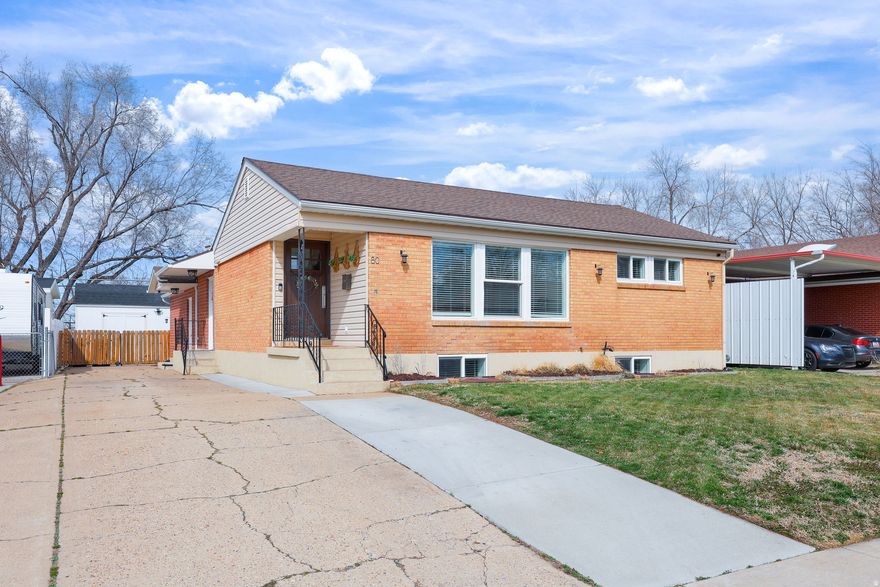 Welcome Home. This beautifully remodeled rambler was rebuilt from the foundation up in 2018, offering peace of mind with updated flooring, walls, roof, electrical, and plumbing. The open-concept layout creates a warm, inviting space filled with natural light and easy living. Hard surface flooring flows throughout the home, while generous storage keeps everything in its place. Step outside to a fully fenced backyard that backs the Ogden Golf & Country Club-an incredible setting where you can relax, unwind, and take in the beautiful mountain and golf course views.  A storage shed is included for added convenience.