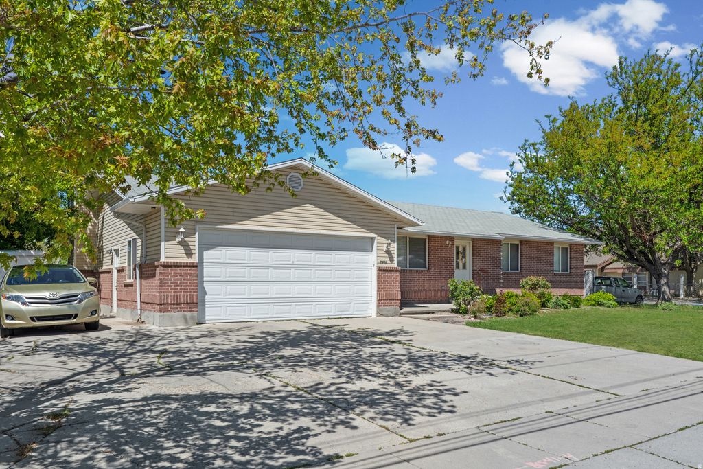 Photo of 7402 S TEMPLE DR W, West Jordan, UT 84084 (MLS # 2156398)